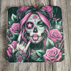 Mouse pad with a colorful design of a woman with pink hair and roses on a wooden surface