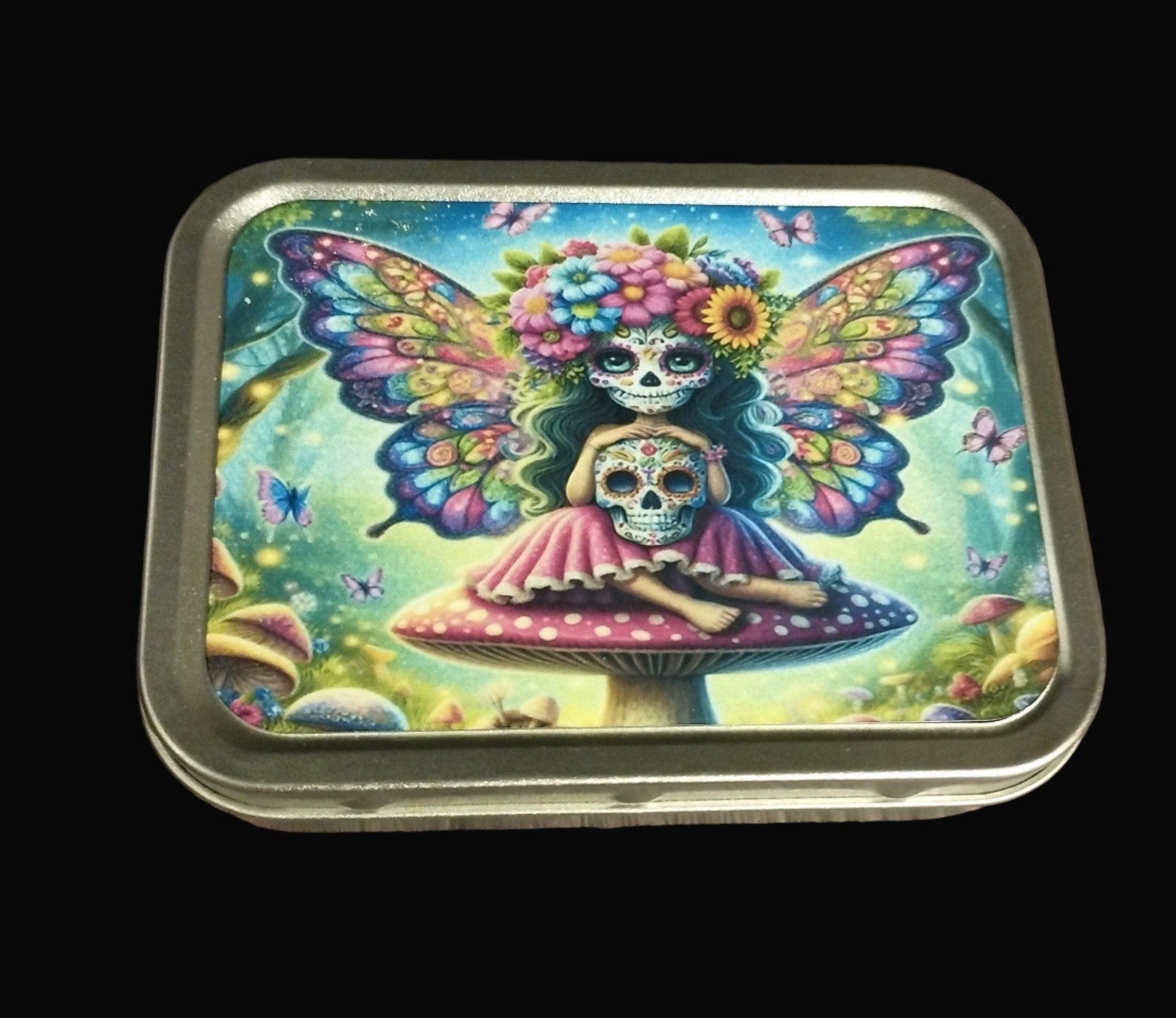 Colorful tin box with a fantasy design of a skeleton fairy
