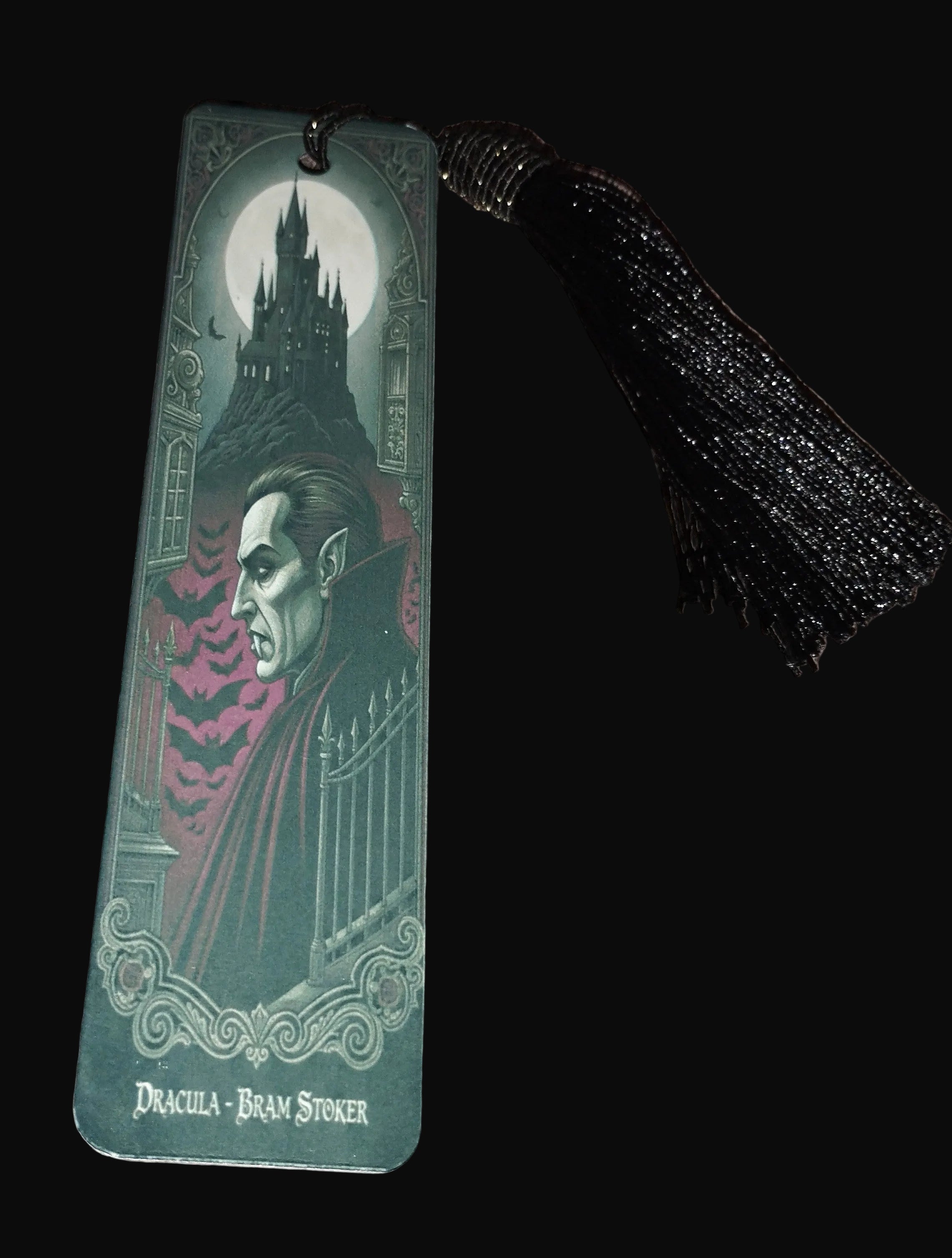 Bookmark with Dracula design on a wooden surface