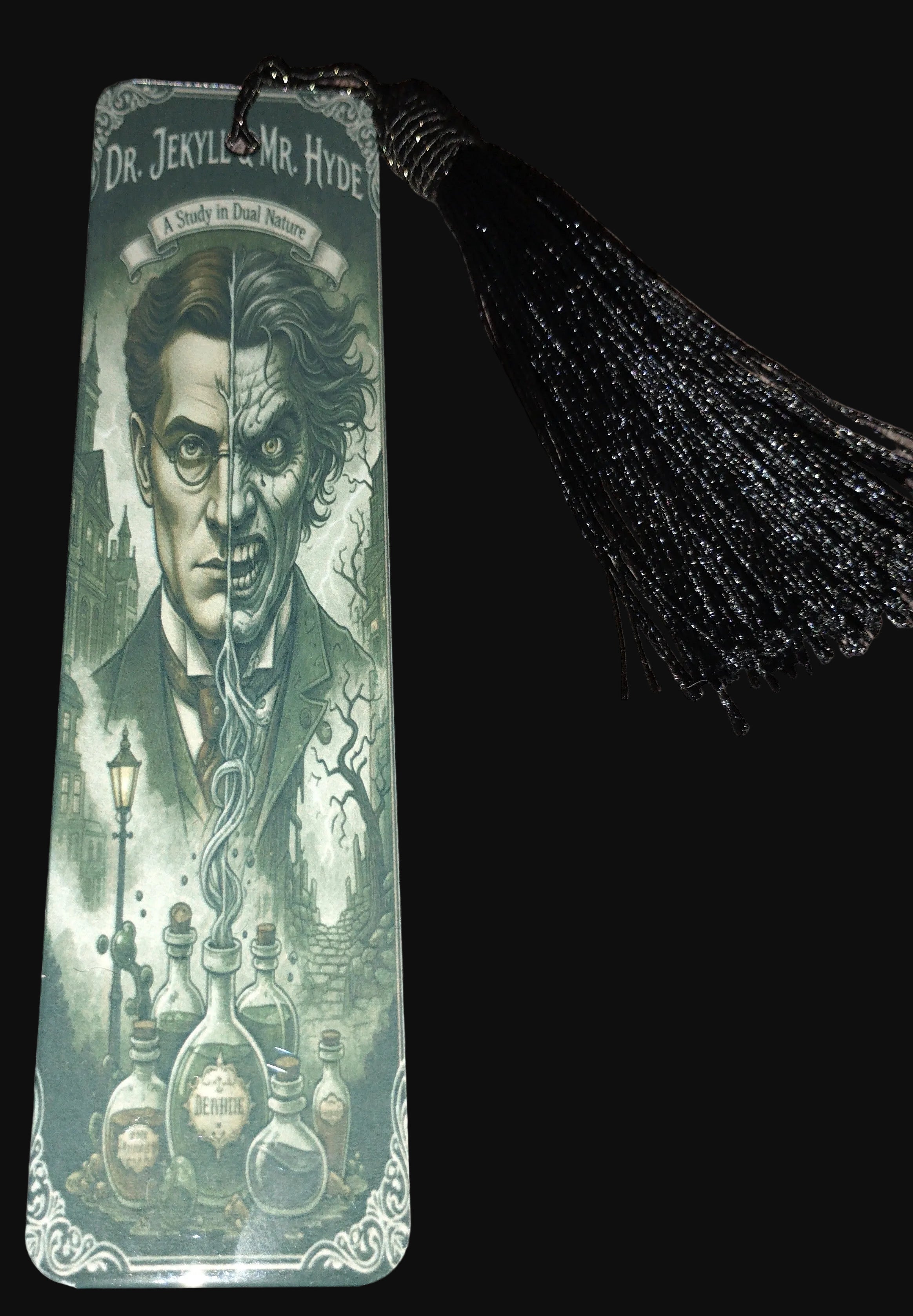 Bookmark with a portrait and tassel on a wooden surface