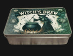 Tin box with 'Witch's Brew' design featuring a witch and cauldron on a wooden surface.