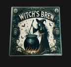 Decorative tile with a witch brewing potion design on a wooden background
