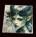 ceramic coaster with dark fae design