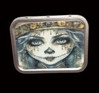 Decorative tin with a artistic depiction of a face on a wooden surface