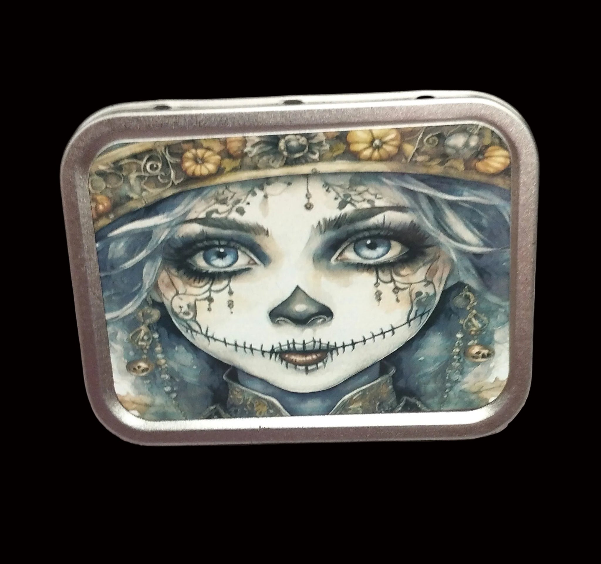 Decorative tin with a artistic depiction of a face on a wooden surface