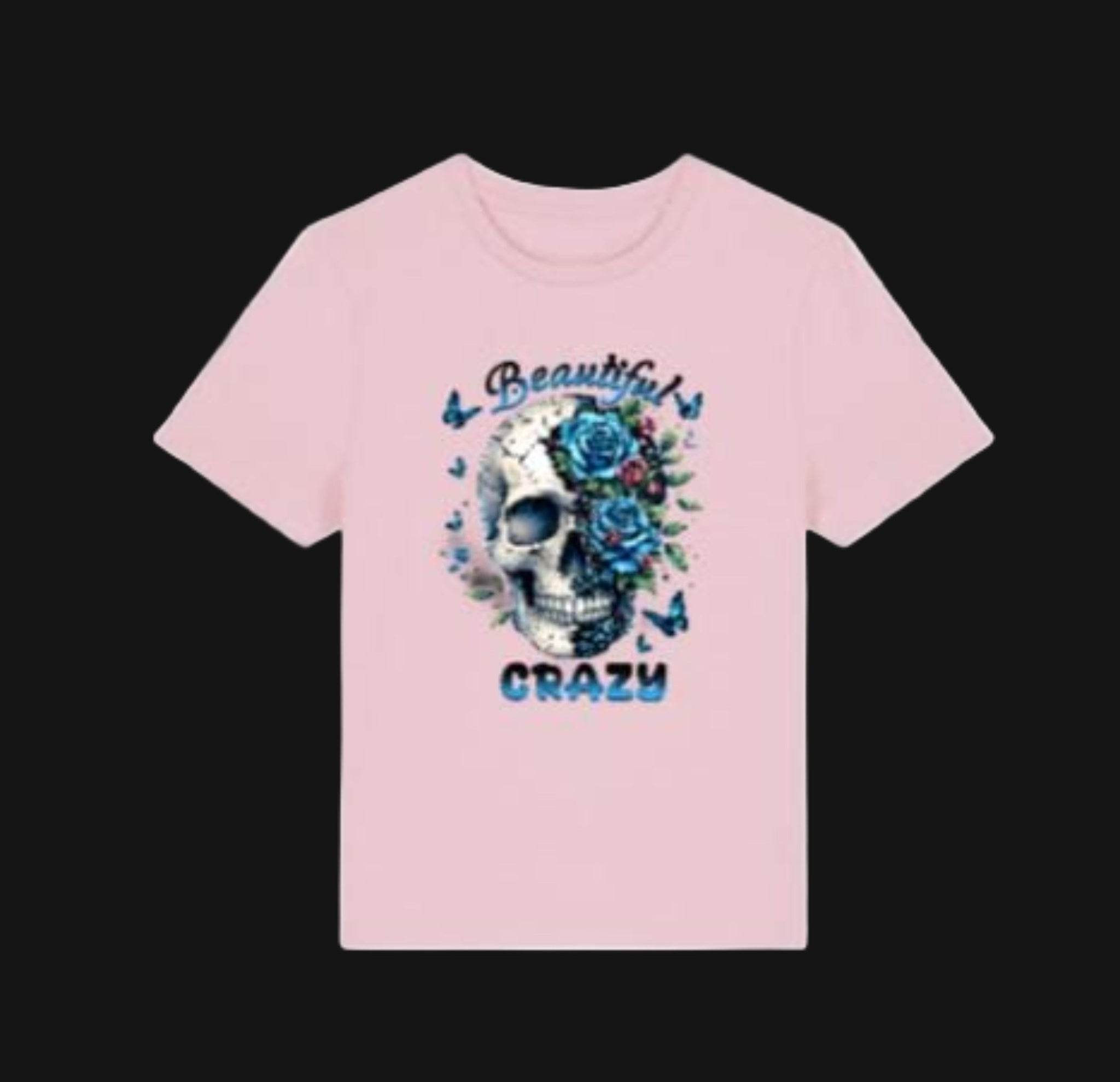 Pink t-shirt with a skull and floral design on a white background