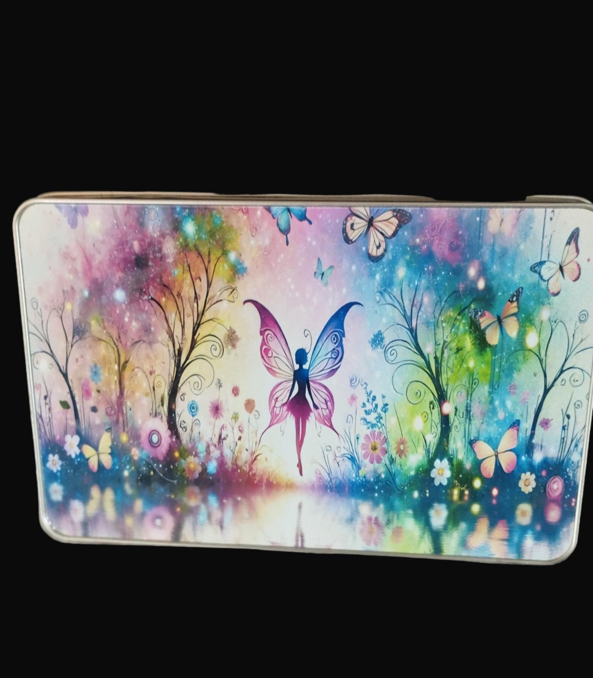Colorful fairy design on a wooden surface