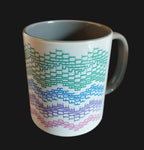Mug with colorful pattern on a wooden surface