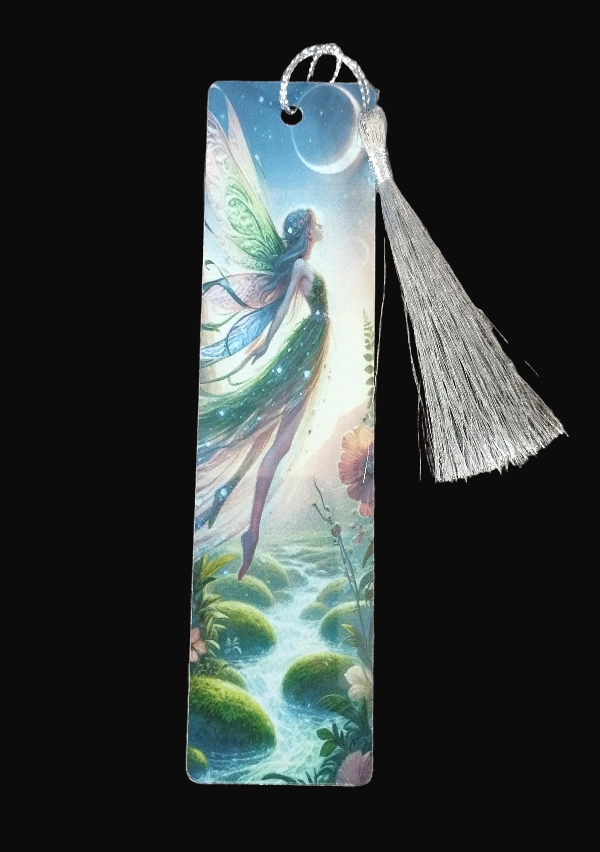 Bookmark with fairy design on a wooden surface