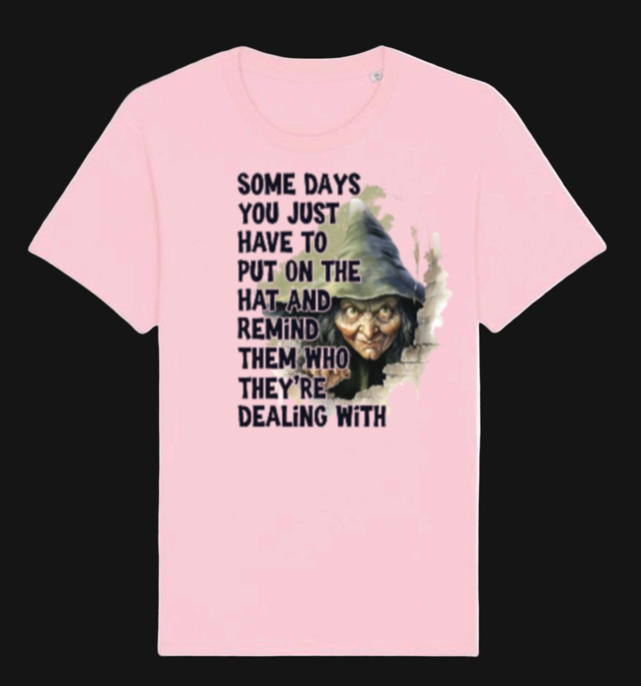 Pink t-shirt with graphic design and text on a white background