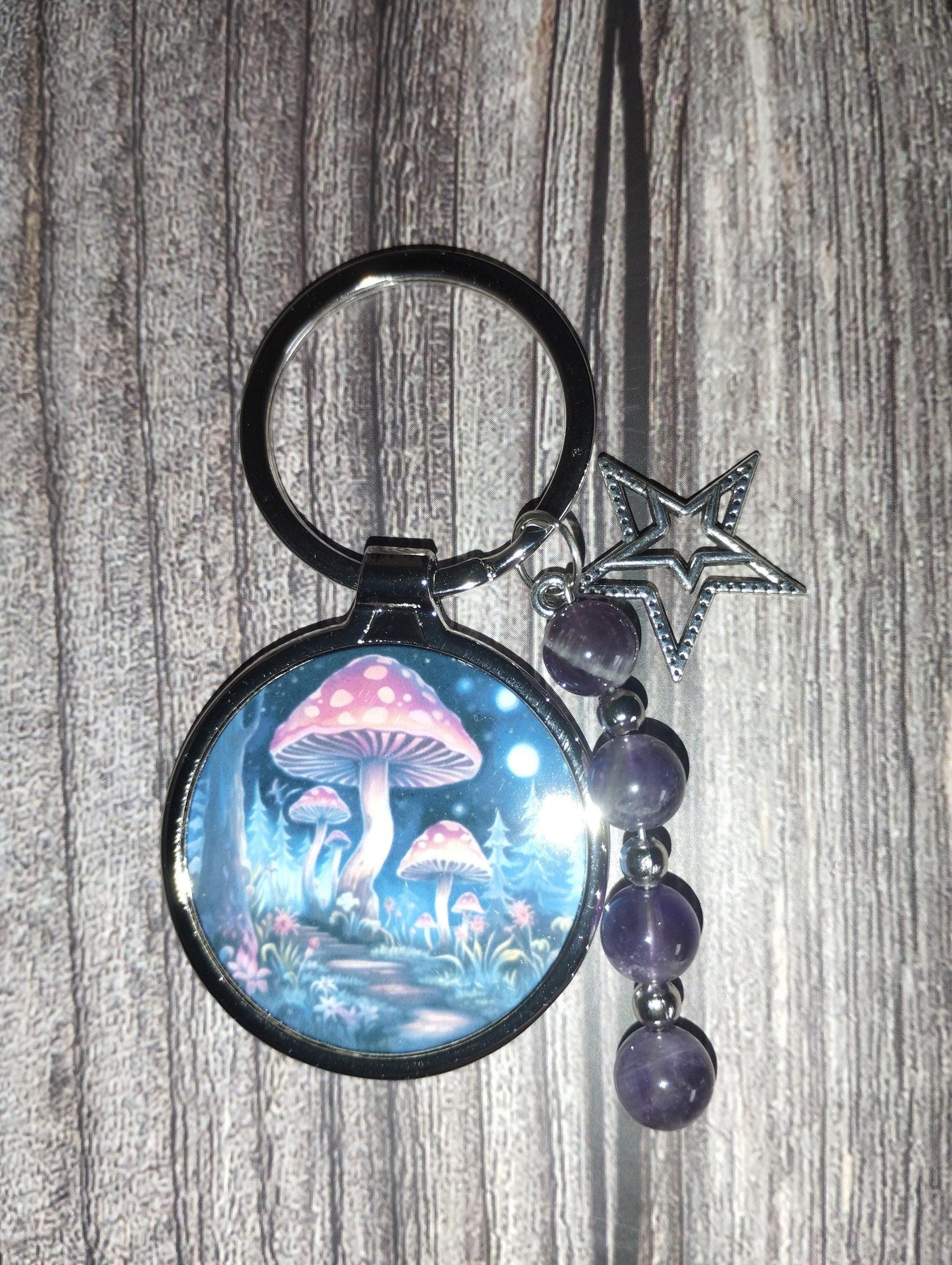 Mushroom keyring with amethyst crystals and a charm