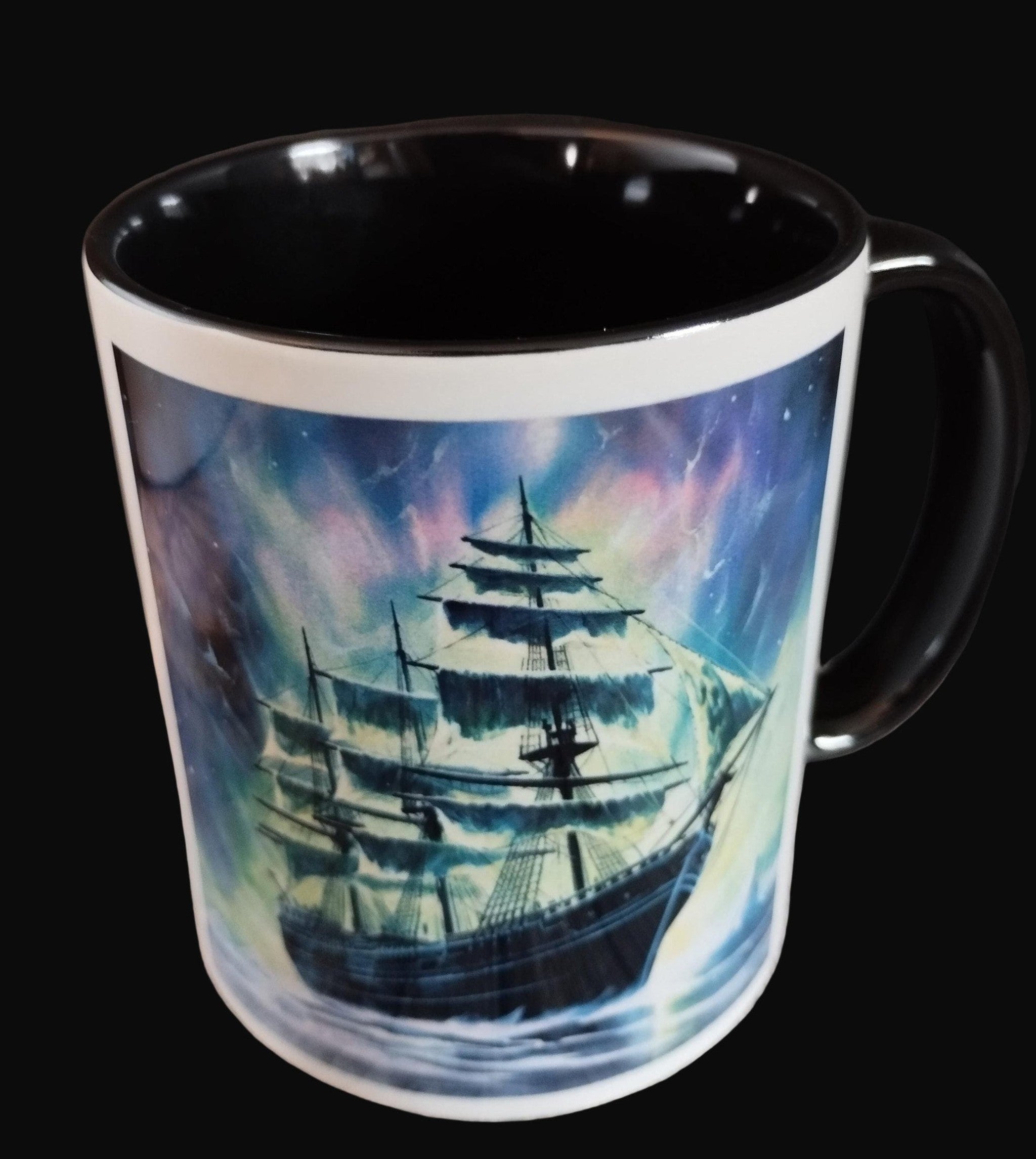 Mug with a ship design on a wooden surface