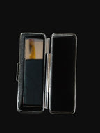 Interior of a lipstick tin