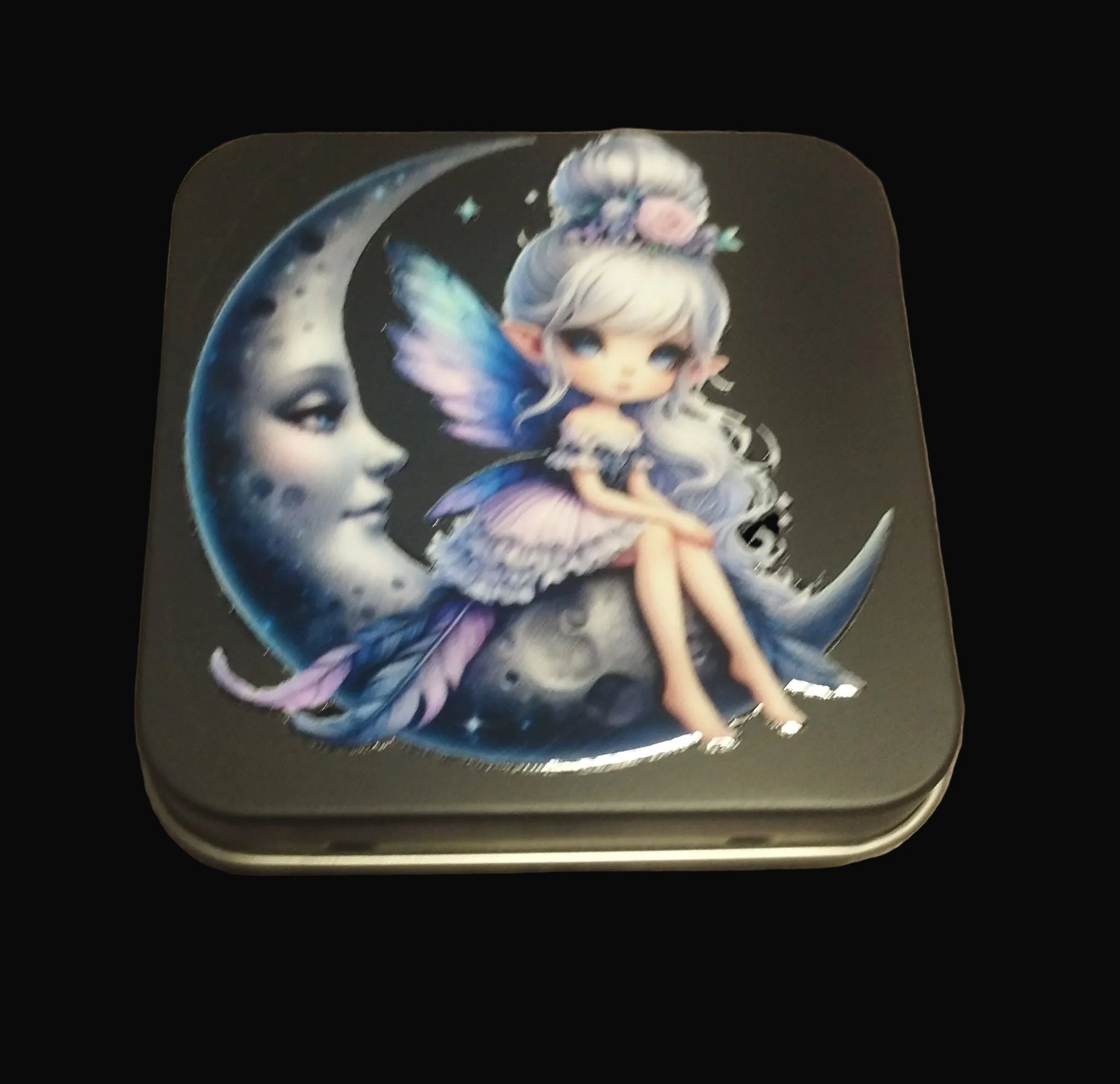 Moon Fairy Trinket Tin - small black metal tin with a fairy sitting on a crescent moon design