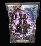 Framed artwork titled 'The Doctor' with a gothic figure and ornate design.