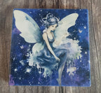 Fairy coaster on a wooden surface