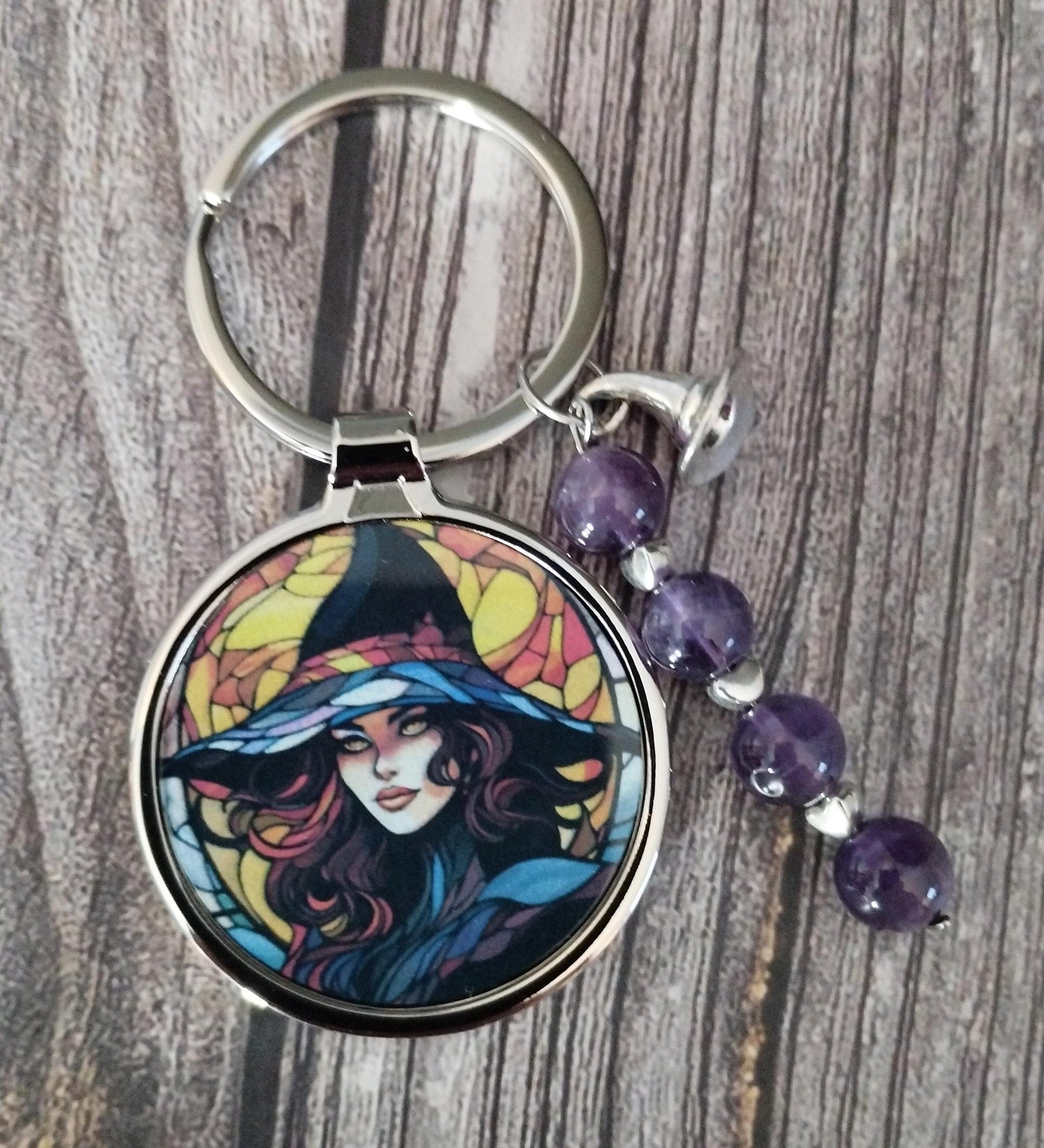 Witch keyring with amethyst crystals and a charm