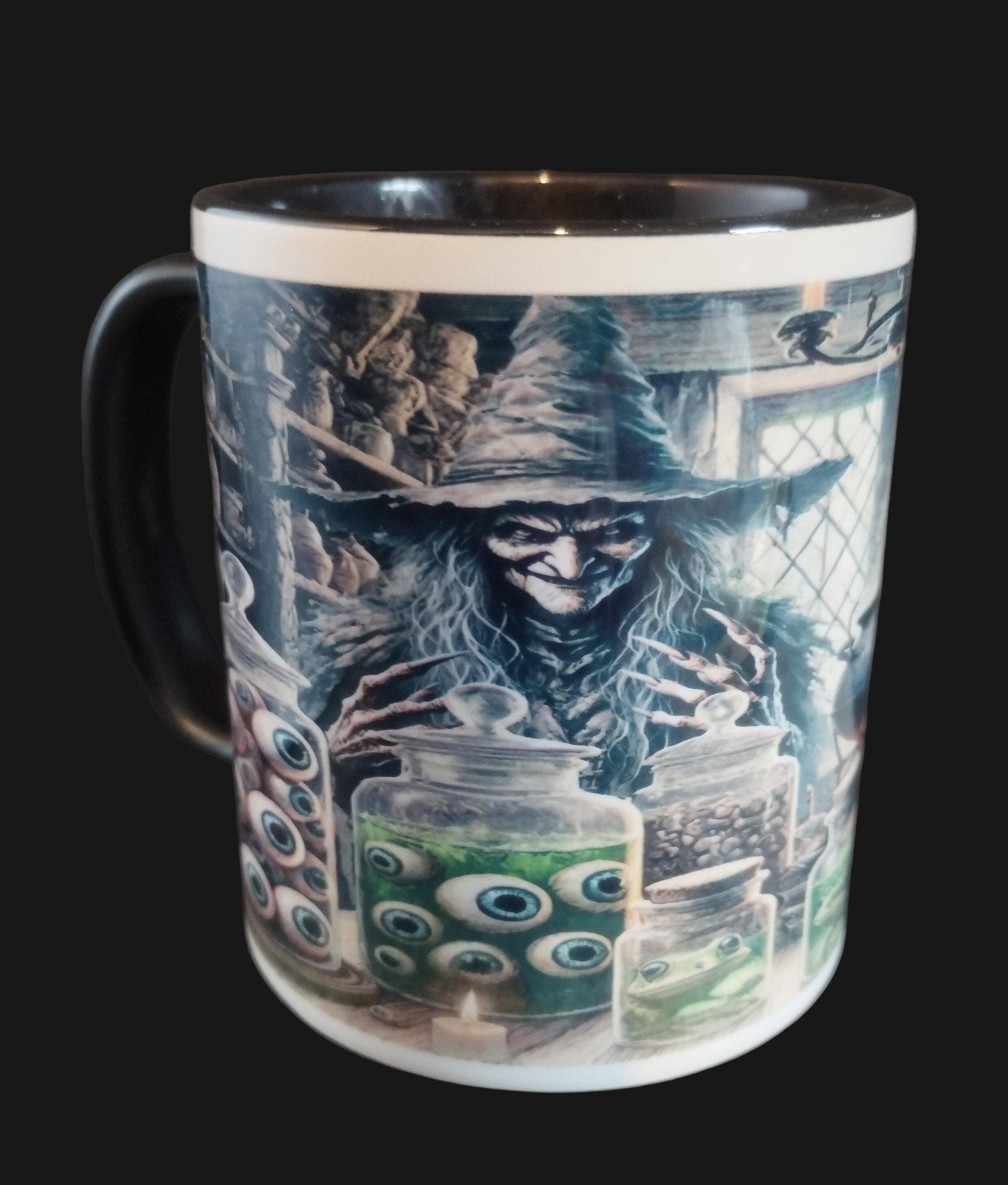 Mug with a witch and potion design on a dark background