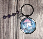Mushroom keyring with amethyst crystals and a charm