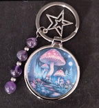 Mushroom keyring with amethyst crystals and a charm