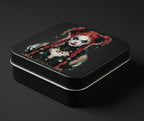 Black tin box with a colorful illustration of a character on a dark background