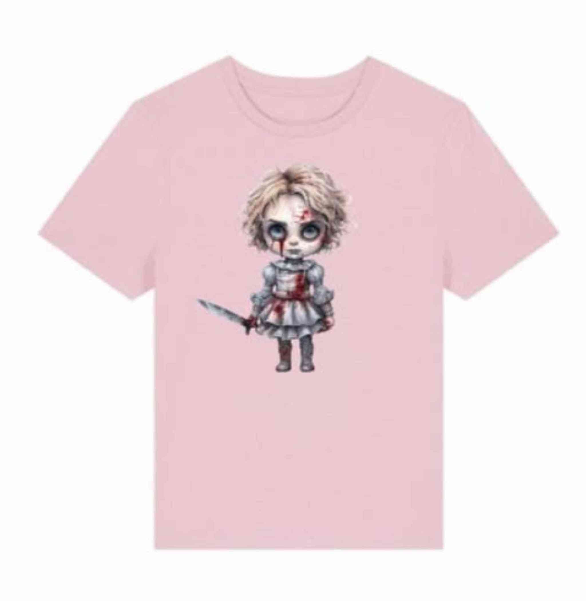 Pink t-shirt with a graphic of a doll holding a knife on a white background