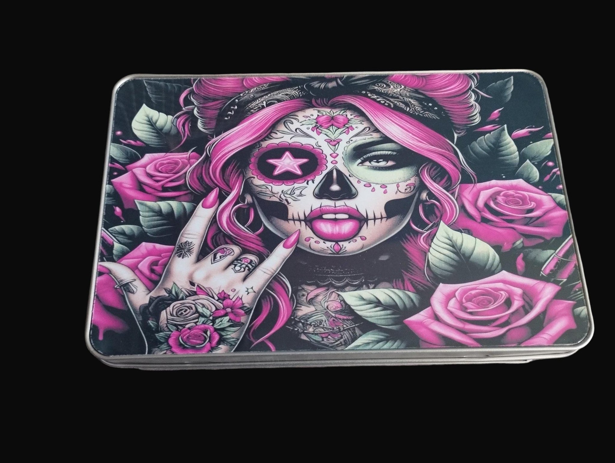 Decorative tray with a colorful skull design on a wooden surface