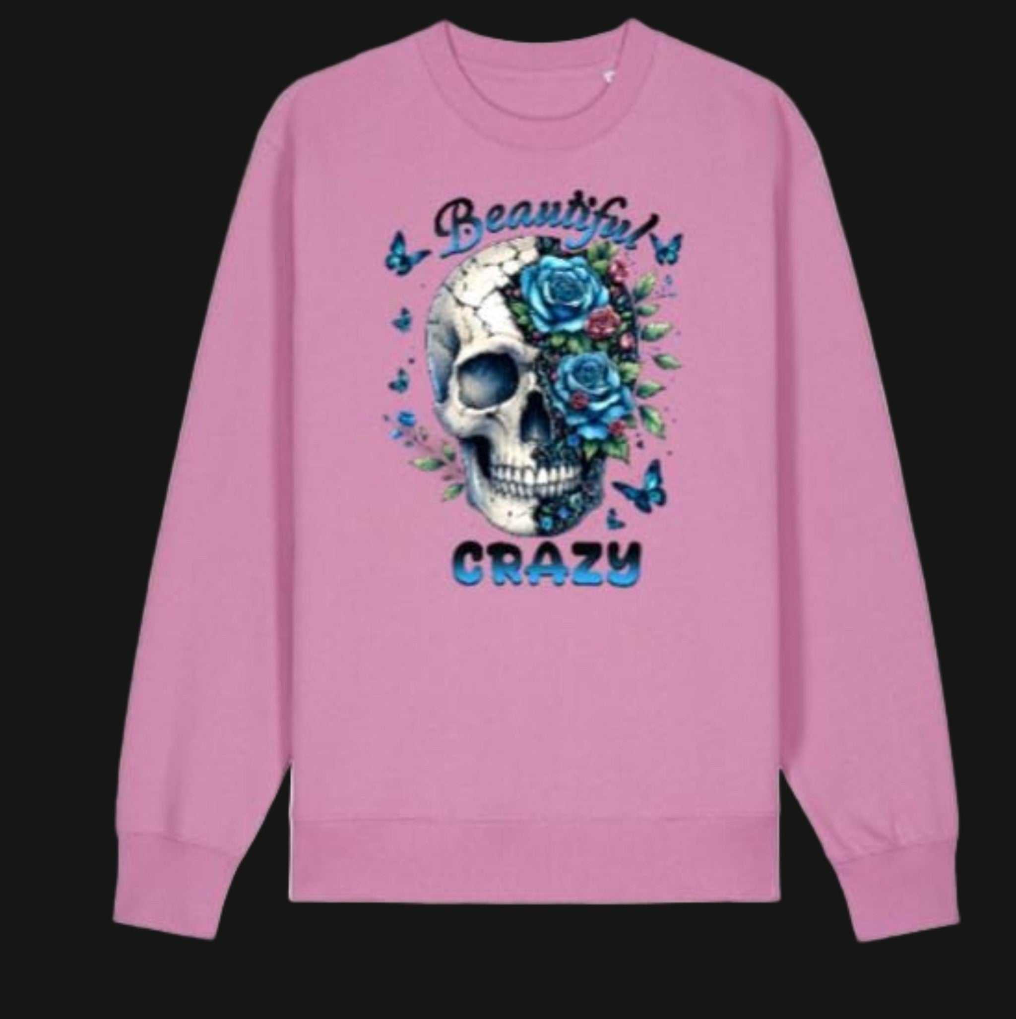 Pink sweatshirt with a skull and floral design on a white background