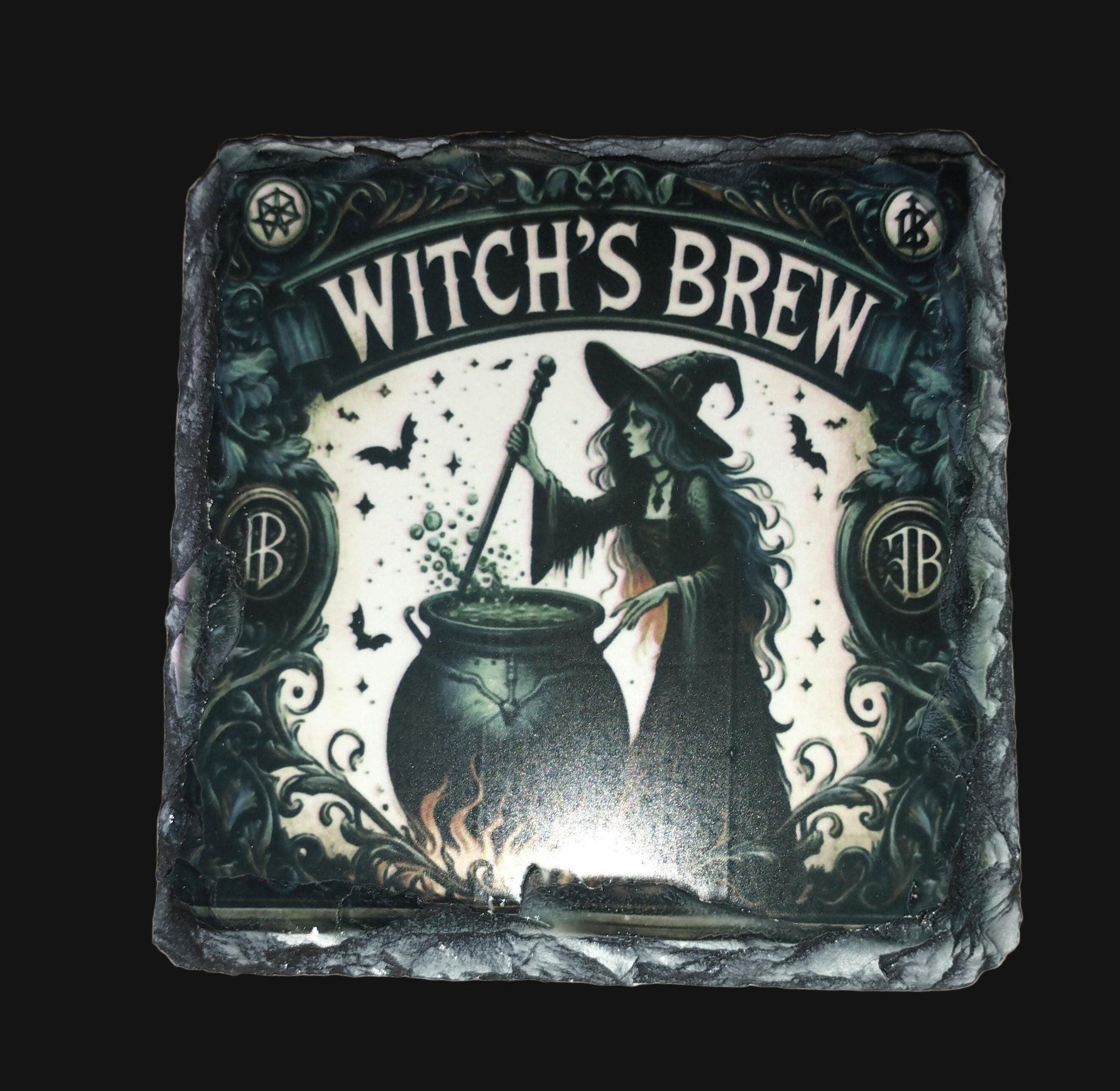 Decorative coaster with a witch and cauldron, labeled 'Witch's Brew', on a wooden background.