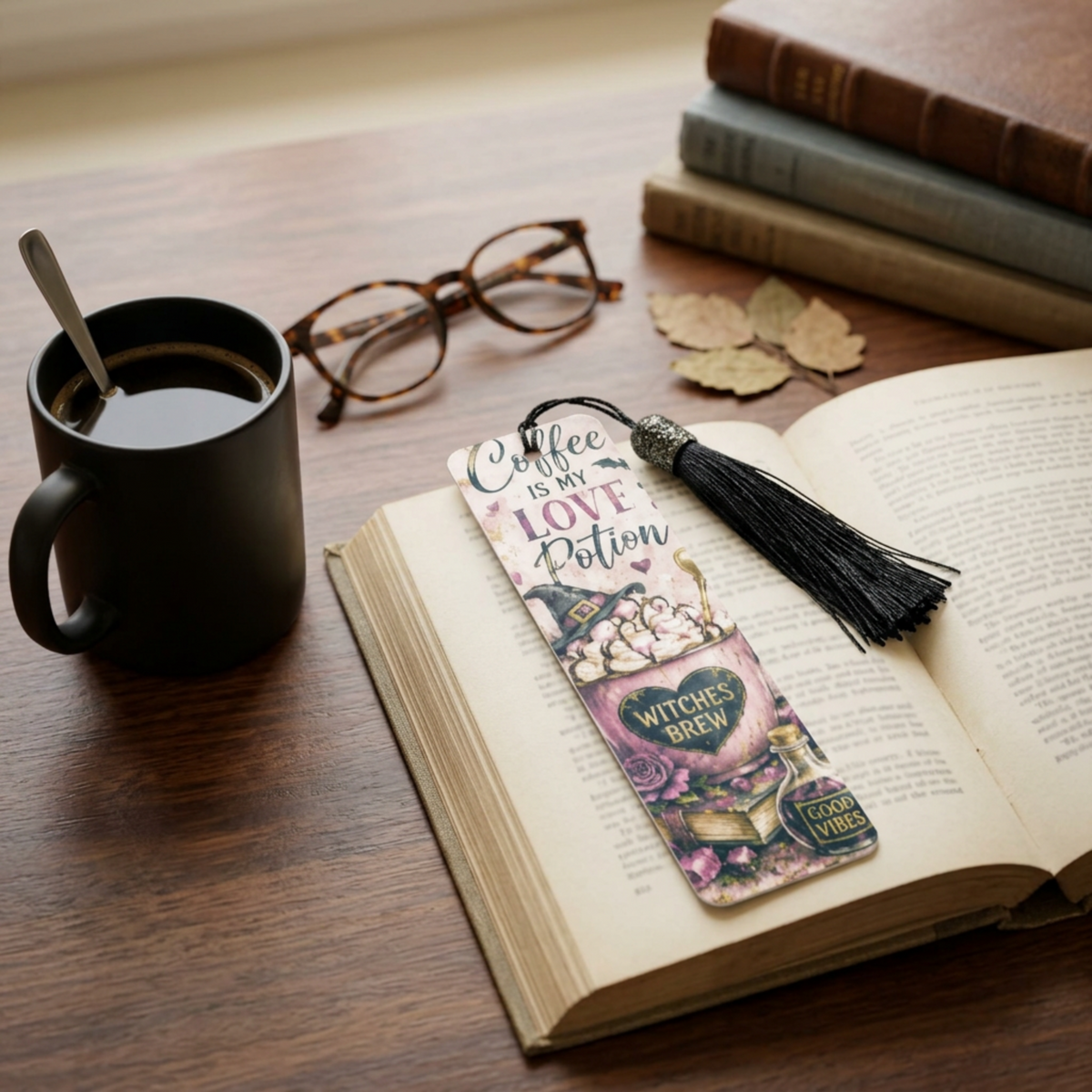 Coffee Is My Love Potion bookmark styled with a book and coffee in a cosy witchy reading nook