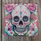 Colorful skull design with flowers on a wooden surface