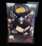 Framed artwork of a creature with horns reading a book against a starry night sky.