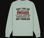 Light green long-sleeve shirt with text design on a white background