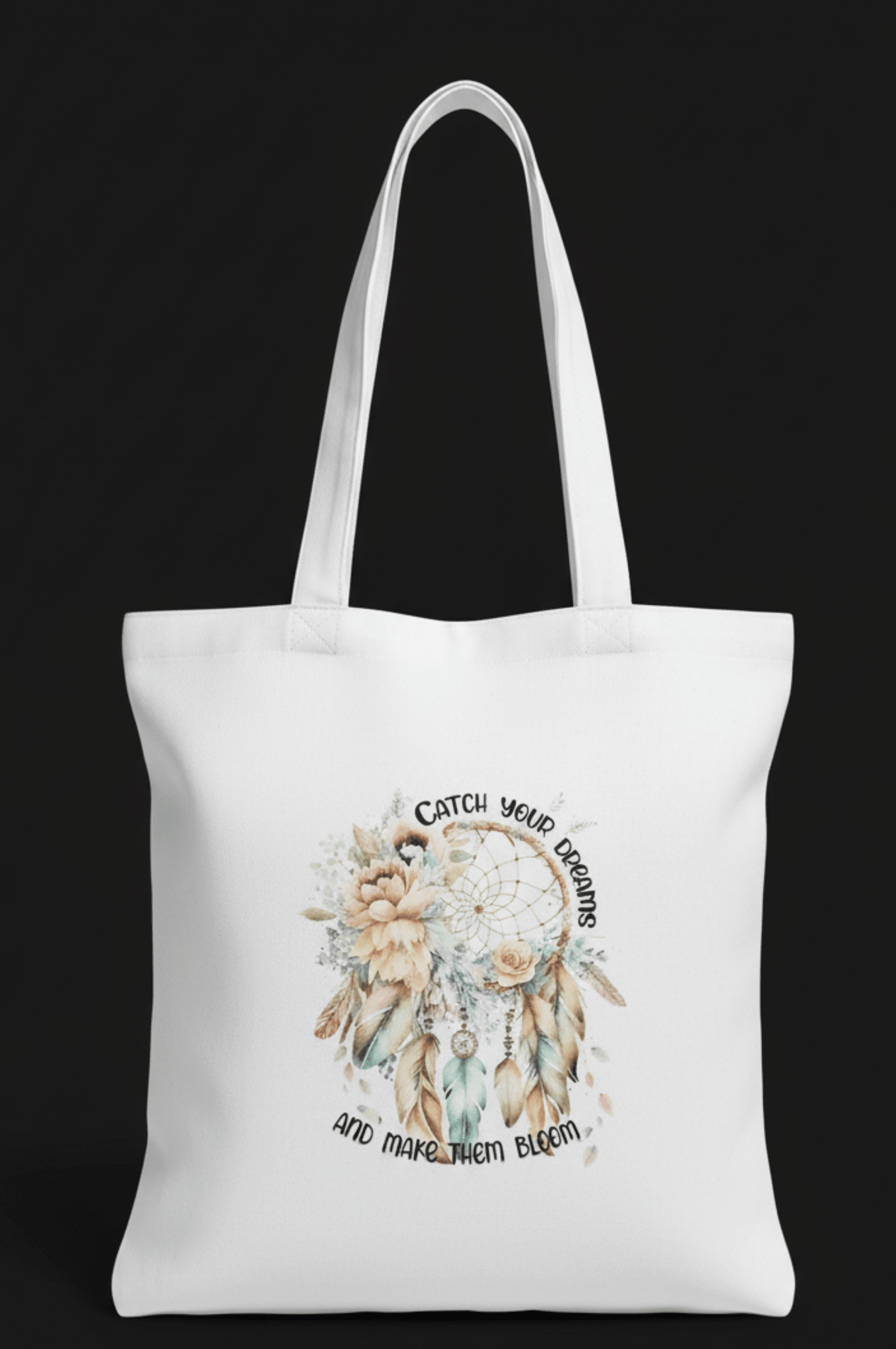 White tote bag with a dreamcatcher design and text on a black background