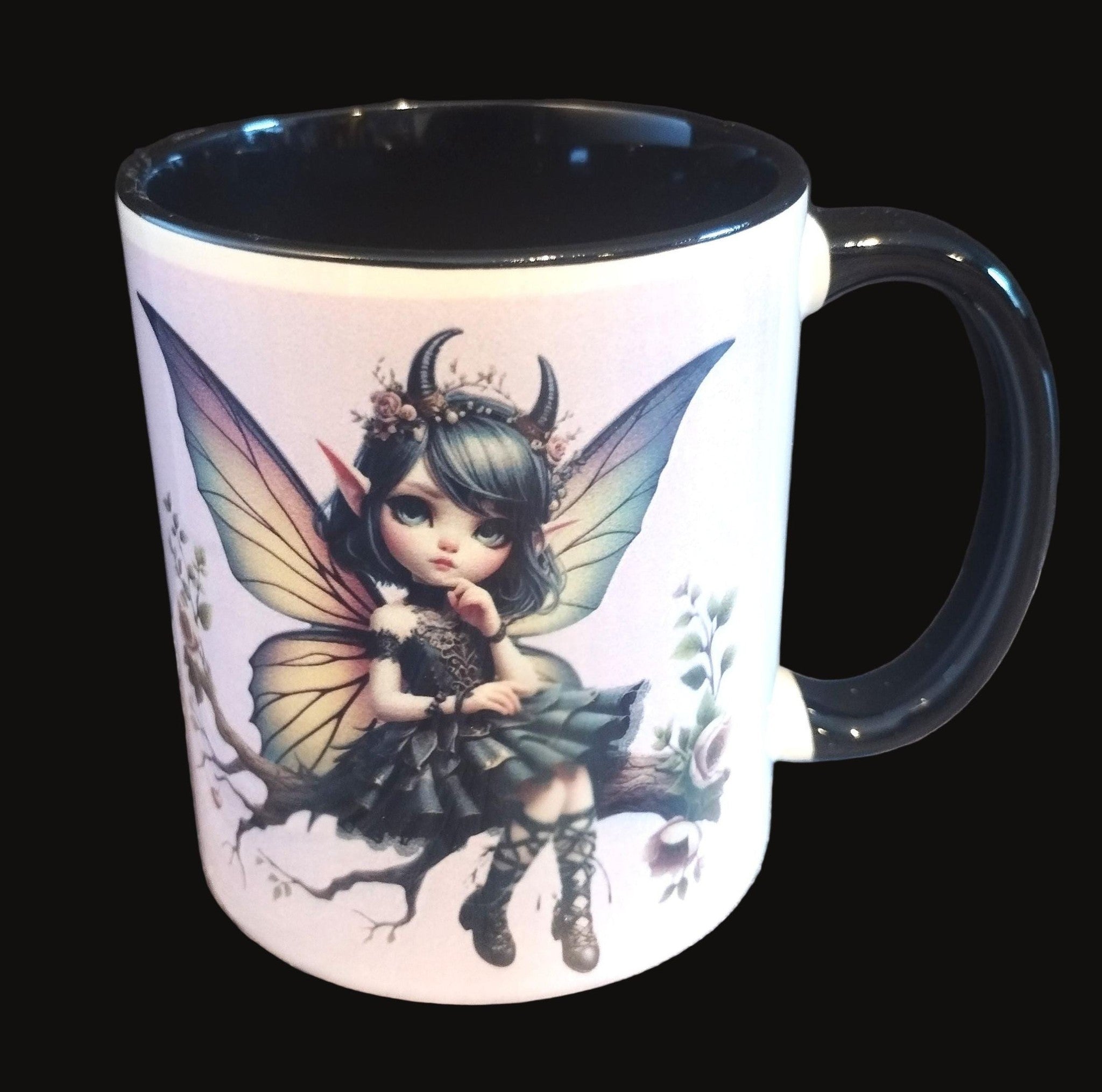 Mug with a fairy design on a wooden surface