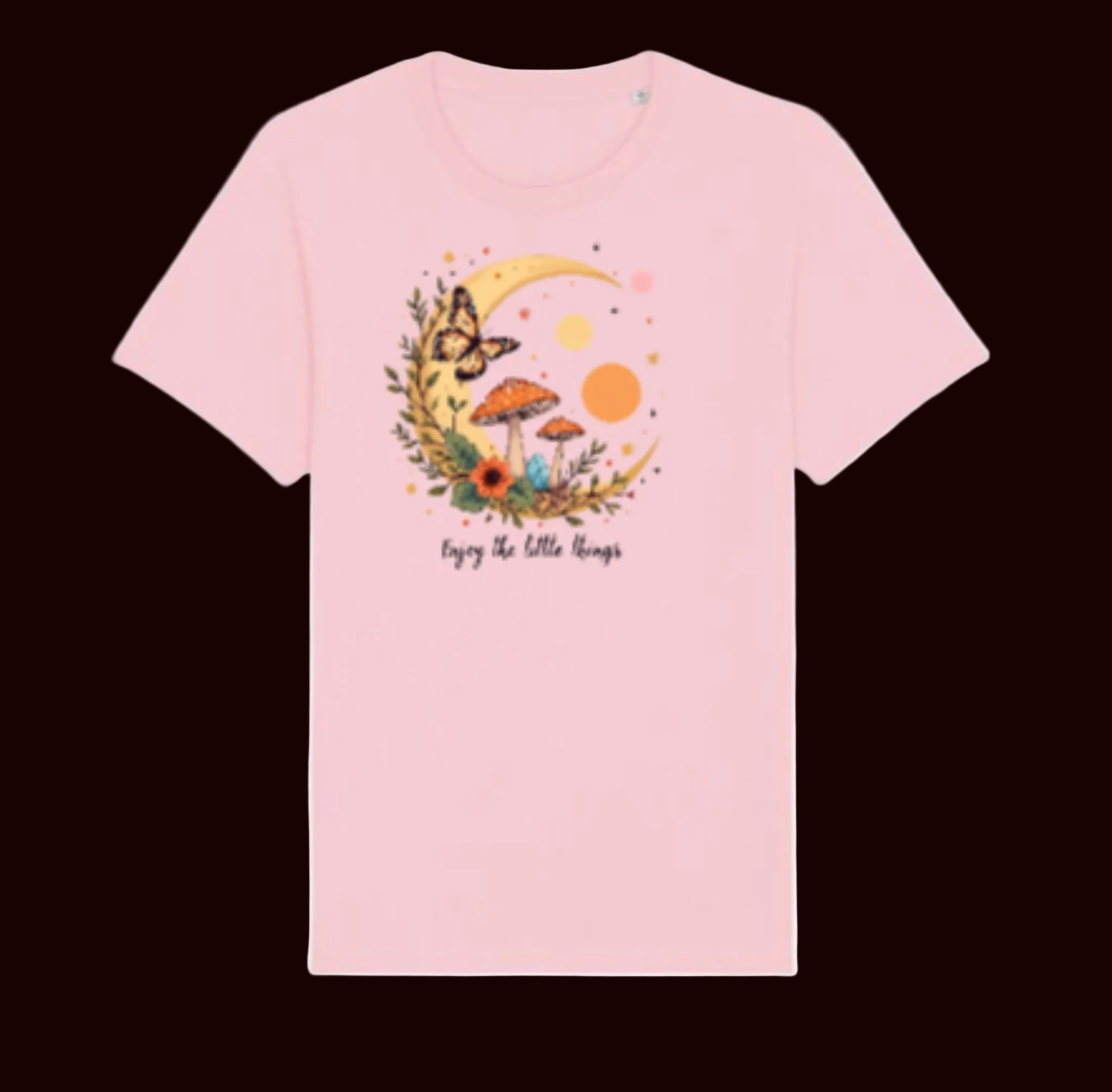Pink t-shirt with a nature-themed graphic and text on a white background
