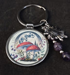 Mushroom keyring with amethyst crystals and a charm