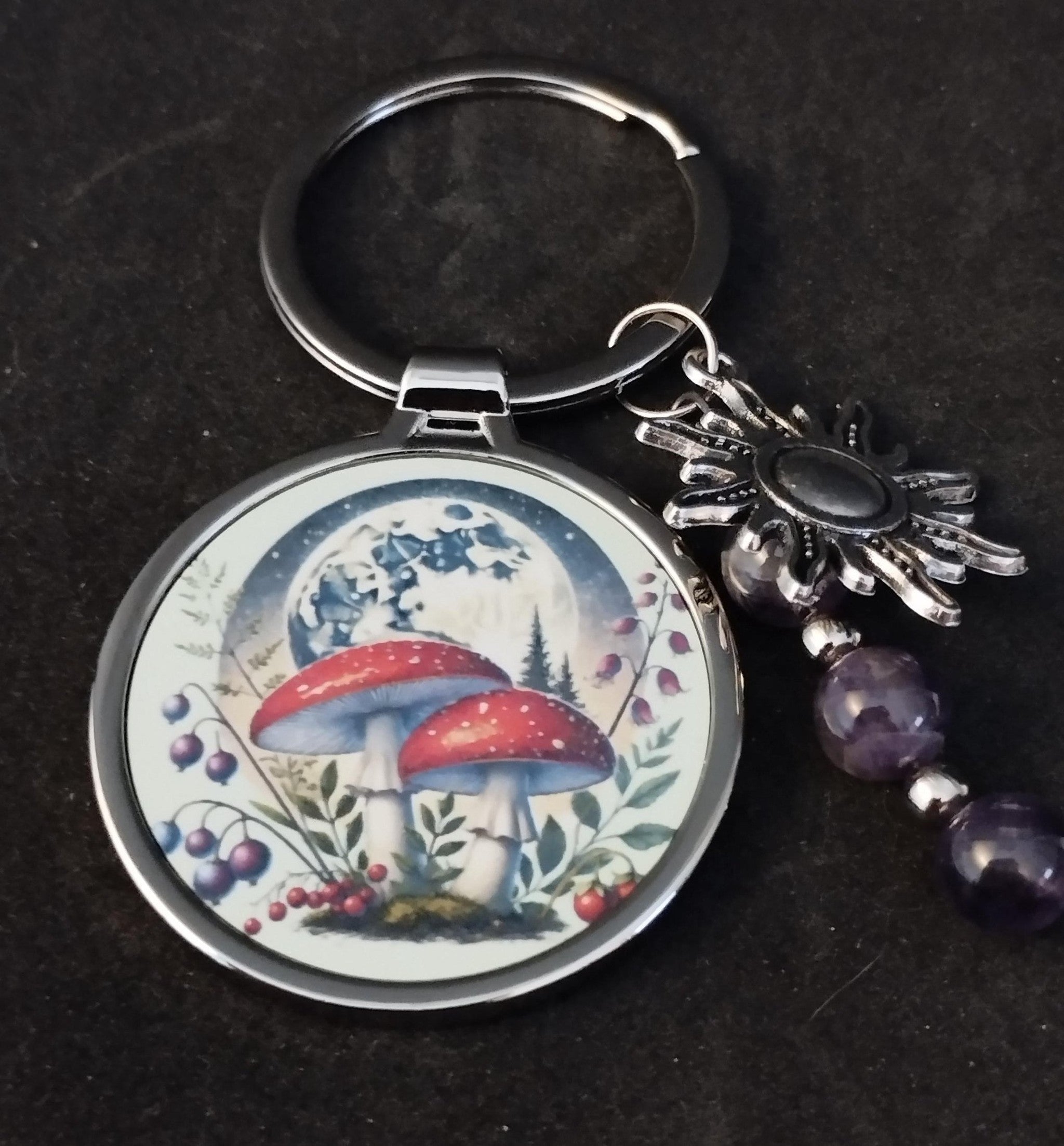 Mushroom keyring with amethyst crystals and a charm