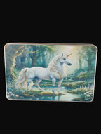 Unicorn tin on a wooden surface
