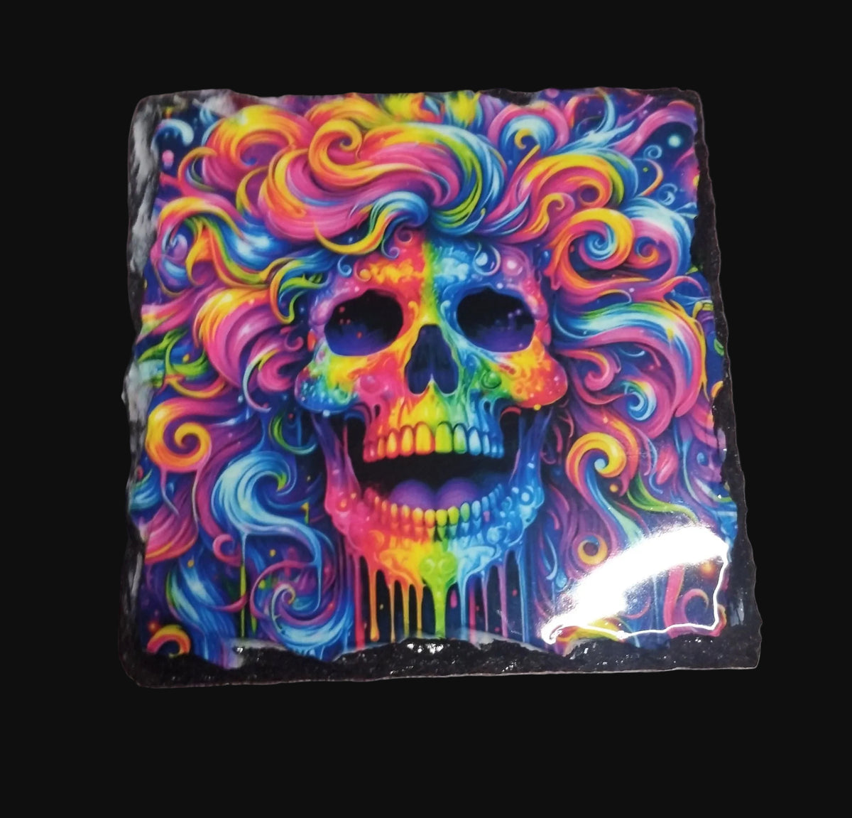 Neon rainbow skull slate coaster with vibrant swirling colours on natural slate