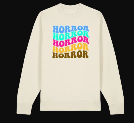 Beige sweatshirt with 'Horror' text in colorful letters on a white background