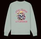 Light green long-sleeve shirt with skull design and text on a white background