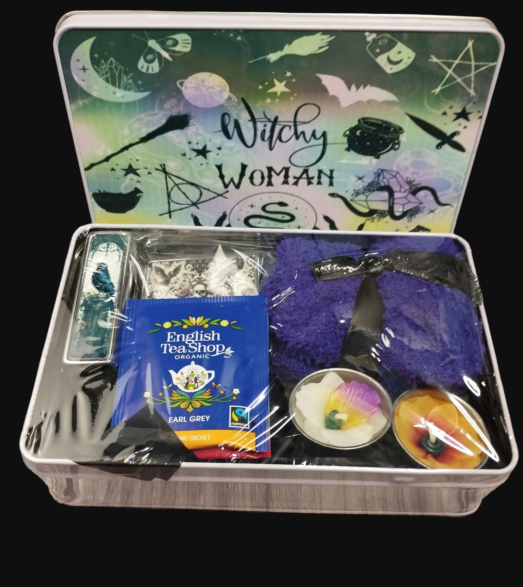 Witchy Woman themed gift set with tea, candle, and other items in a tin.